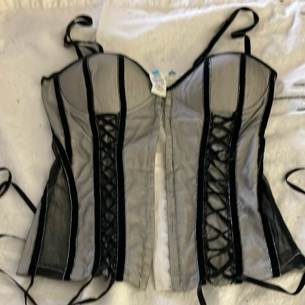 This is a black beige off white Corset